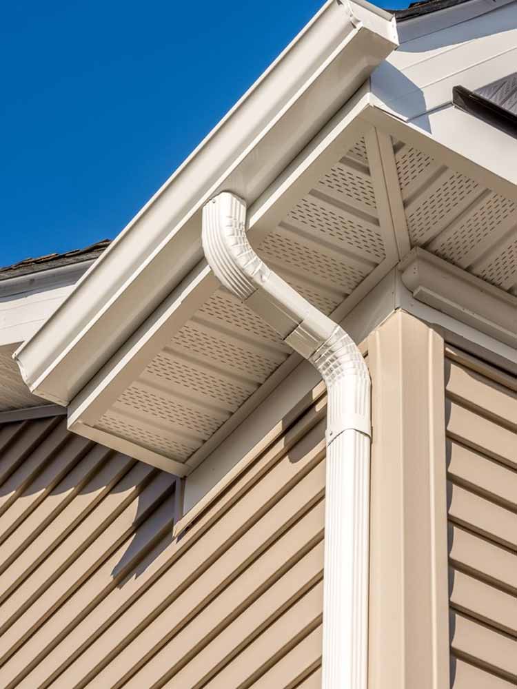 Gutter along brick house