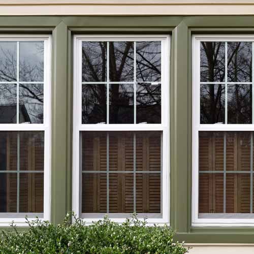 Storm damaged shingle with circled damage marks